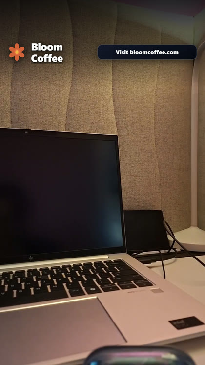 A clip from a Business mode line with the brand burned in: the logo, the name and a Visit button with the website.